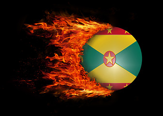 Image showing Flag with a trail of fire - Grenada