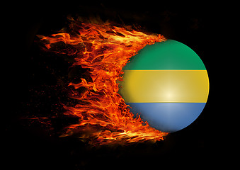 Image showing Flag with a trail of fire - Gabon