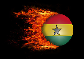 Image showing Flag with a trail of fire - Ghana