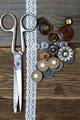 Image showing vintage buttons, lace, and a dressmaker scissors