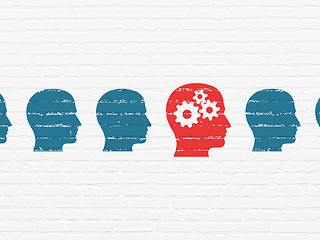 Image showing Business concept: head with gears icon on wall background