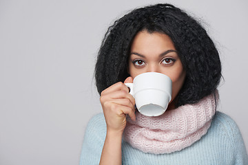 Image showing Smiling winter woman with cup of coffee
