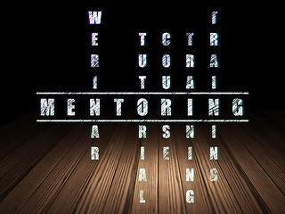 Image showing Education concept: word Mentoring in solving Crossword Puzzle