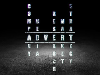 Image showing Advertising concept: word Advert in solving Crossword Puzzle