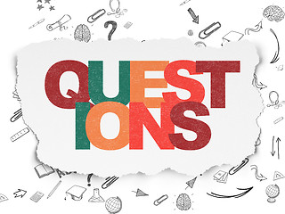 Image showing Learning concept: Questions? on Torn Paper background