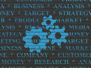 Image showing Advertising concept: Gears on wall background