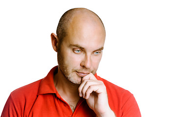 Image showing Thoughtful unshaven man on a white