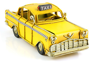 Image showing Old toy yellow taxi