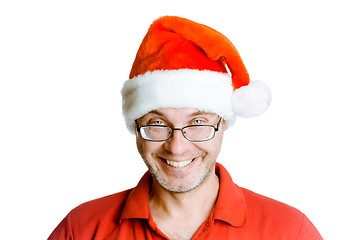 Image showing Smiling happy unshaven man with glasses and a hat Santa