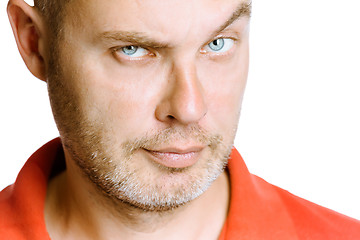 Image showing strict unshaven man on a white background. close up