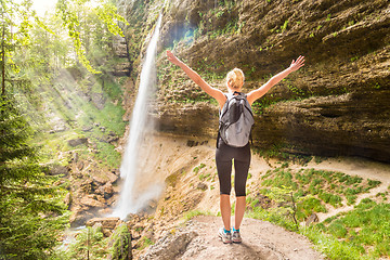 Image showing Active sporty woman relaxing in beautiful nature.