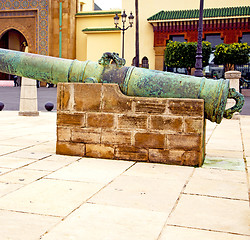 Image showing bronze cannon in africa morocco  green  and the old pavement