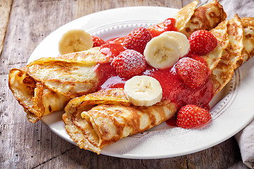 Image showing crepes with strawberries and banana