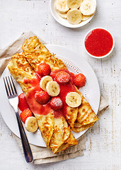 Image showing Crepes with strawberries and banana