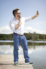 Image showing man taking selfie