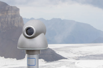Image showing Binoculars against the grey sky