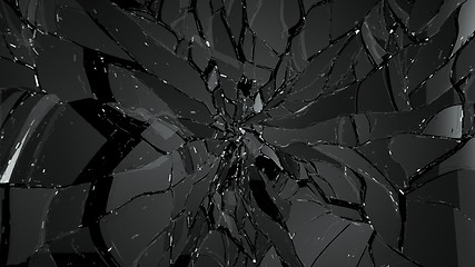 Image showing Splitted or cracked glass on black