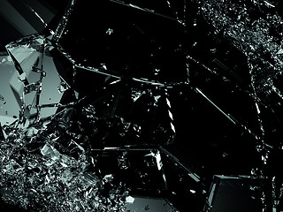 Image showing Broken or cracked glass on black