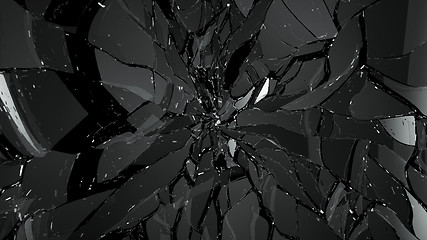 Image showing Demolished or splitted glass on black