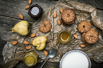 Image showing pears Cookies and cream on wooden table