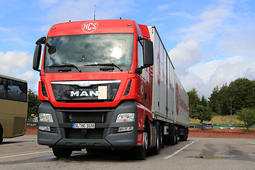 Image showing Red MAN TGX 26.480 Truck and Full Trailer Parked