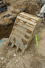 Image showing excavator ploughshare on trench - constructing canalization