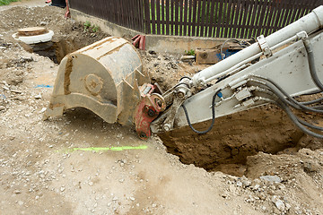 Image showing excavator ploughshare on trench - constructing canalization