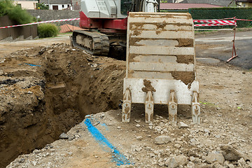 Image showing excavator ploughshare on trench - constructing canalization