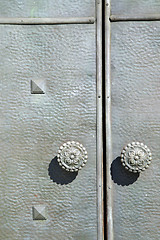 Image showing  varese    knocker in a  door curch  closed  italy  sumirago