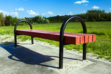 Image showing wooden bench. field
