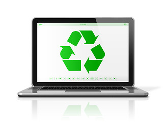 Image showing Laptop computer with a recycling symbol on screen. environmental