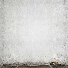 Image showing Tabby cat laying on the bench