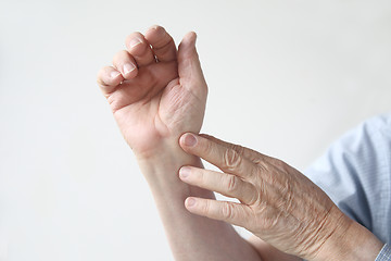 Image showing man with an aching wrist