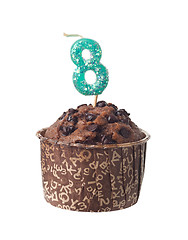 Image showing Chocolate muffin with birthday candle for eight year old