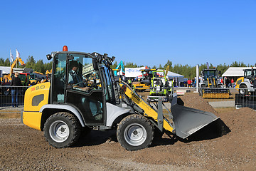 Image showing Kramer Allrad 350 Wheel Loader Moves Gravel