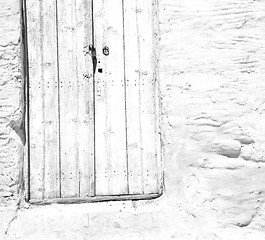 Image showing blue door in antique village santorini greece europe and white w