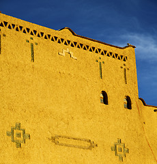 Image showing old brown construction in africa morocco and sky  near the tower