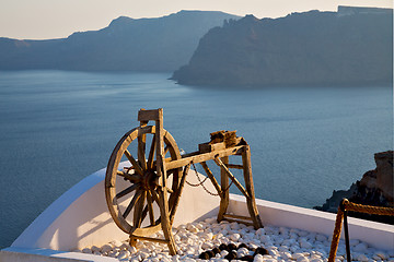 Image showing greece in   sea and spinning wheel