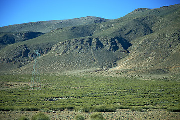 Image showing valley in    electrical line high voltage power  isolated hill 
