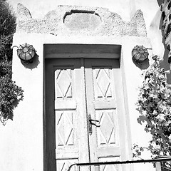 Image showing blue door in antique village santorini greece europe and    whit