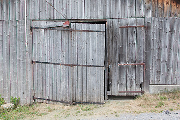 Image showing Old door in a wooden shed