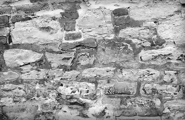 Image showing old brick wall with cracked stucco layer background