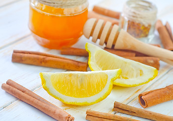 Image showing honey,cinnamon,and lemon