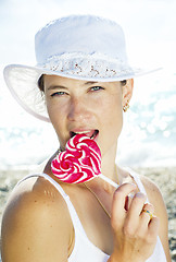 Image showing woman with sweet candy