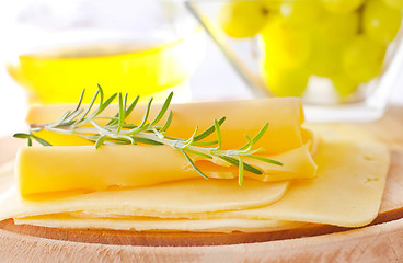 Image showing italian cheese with fresh rosemary and grape