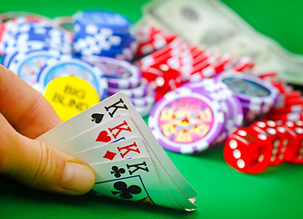 Image showing Card for poker in the hand, chips and card for poker