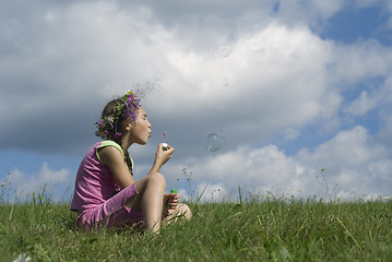 Image showing Girl with  soap bubbles III