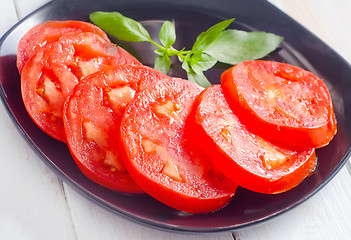 Image showing Fresh tomato with green aroma basil