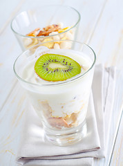 Image showing fresh yogurt and muesli in a glass