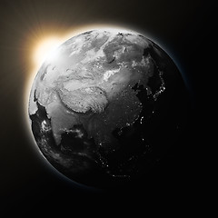 Image showing Sun over Southeast Asia on dark planet Earth